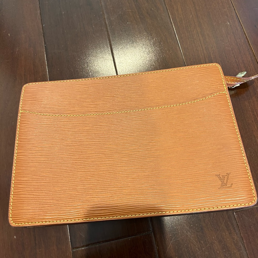 Vuitton tan leather clutch